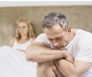 Man dealing with private prostate symptoms and relationship stress