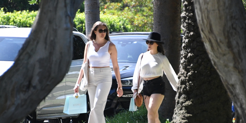Adults walking in a park as part of an active lifestyle